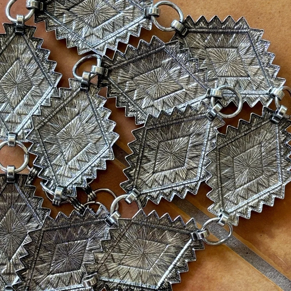 Aztec style silver tone belt